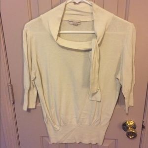 Light ivory sweater with jaunty neck tie